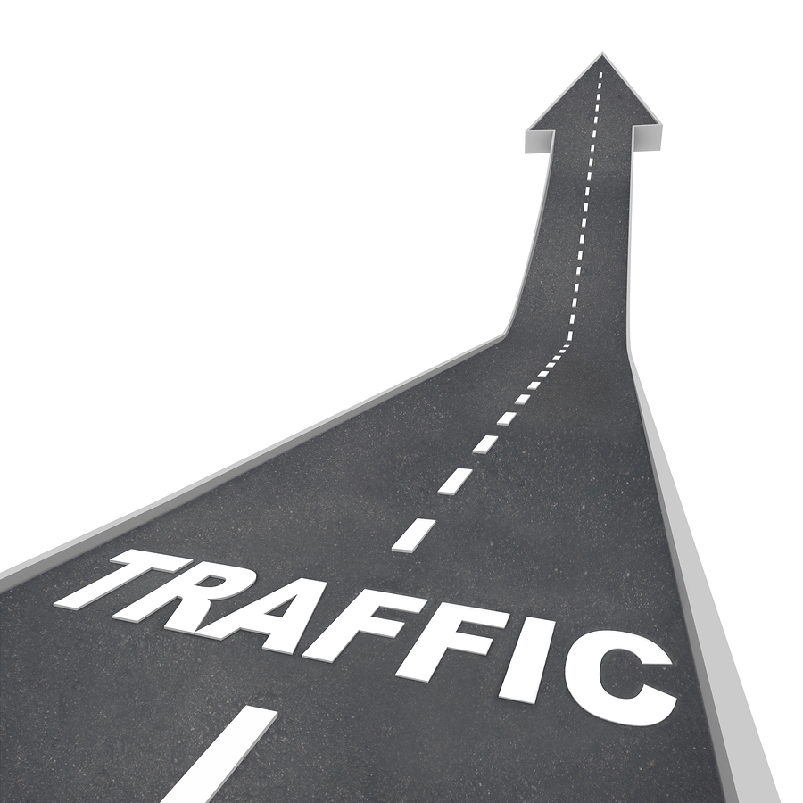 The word Traffic on a road rising up to represent increased acti