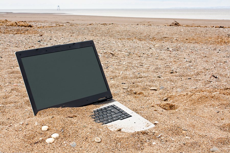 Laptop Personal Computer On The Beach